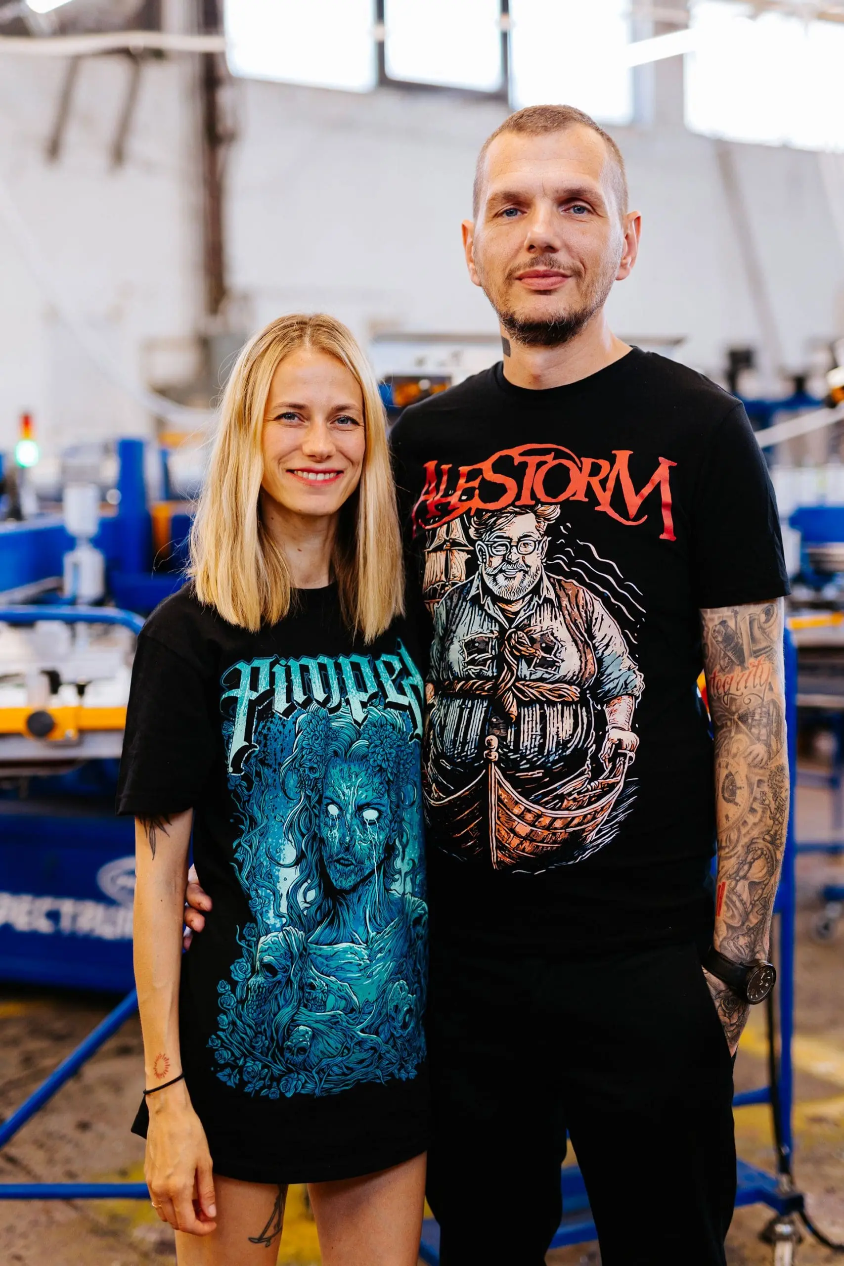 Real Pimp founders in their Budapest workshop showcasing custom printed metal band t-shirts