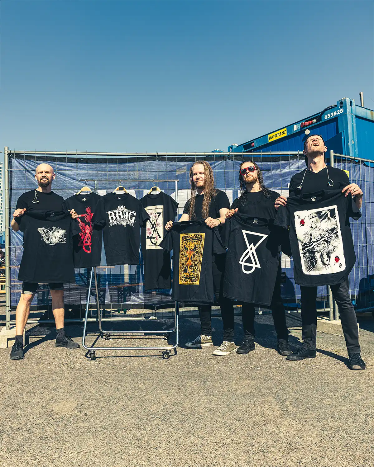 Bloodred Hourglass metal band showcasing custom tour merchandise t-shirts by Real Pimp