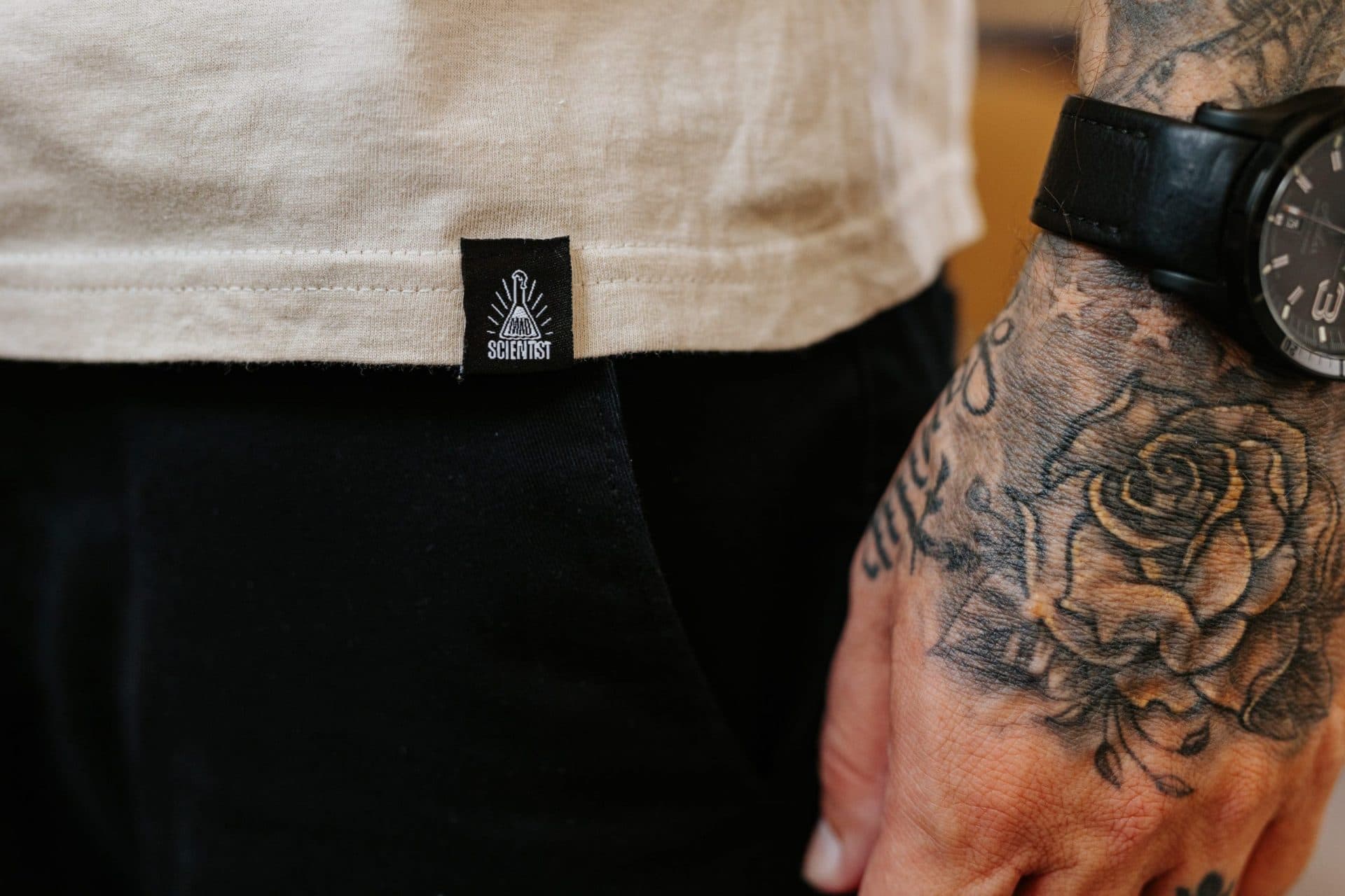 THE SCIENTIST custom woven brand label with embroidered logo for premium merchandise